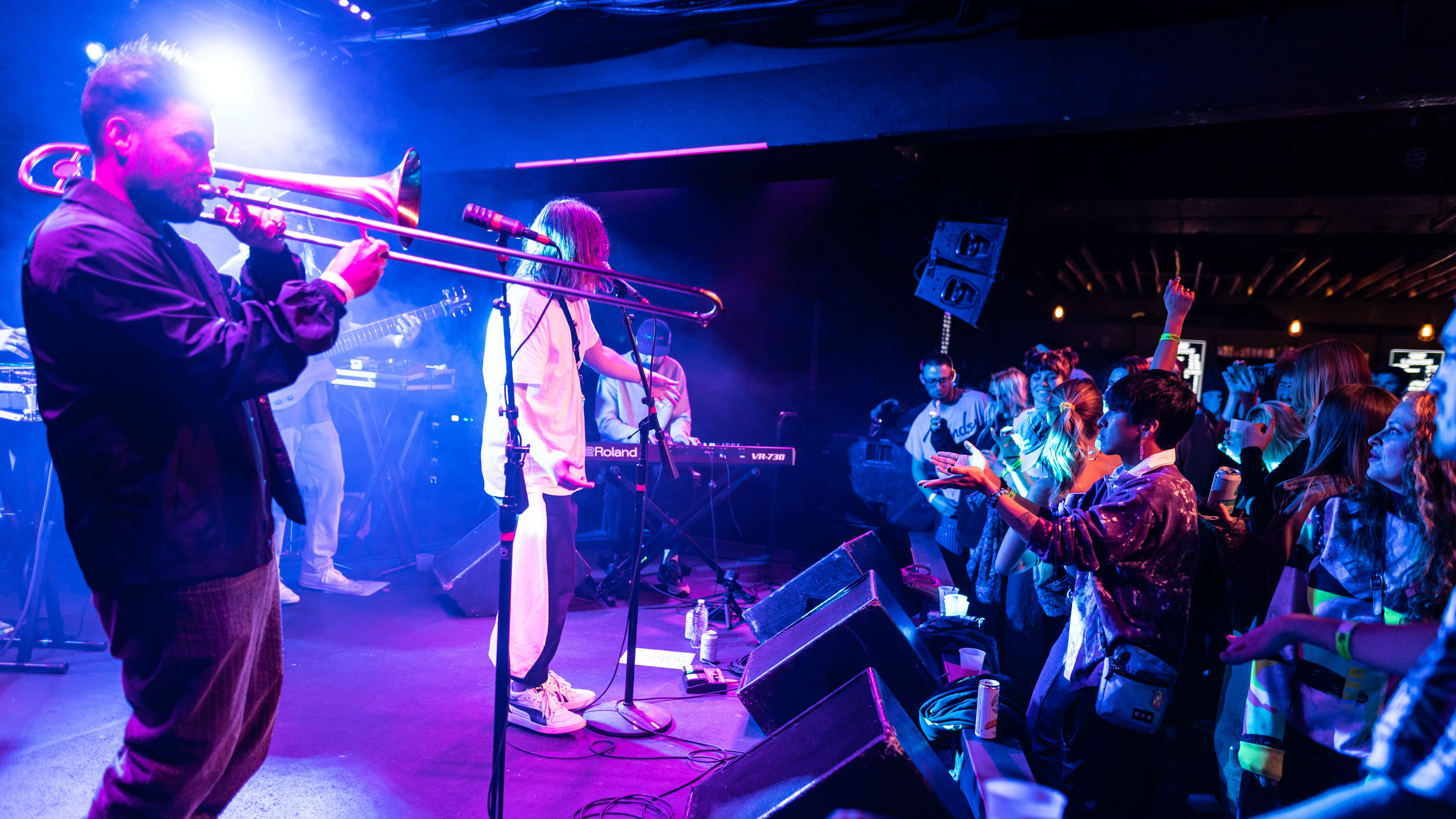 An artist performs at Marquis
