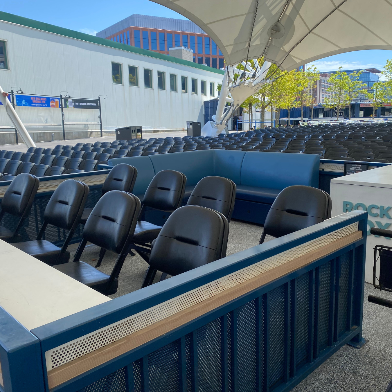 An empty area with leather like seats at the amphitheater