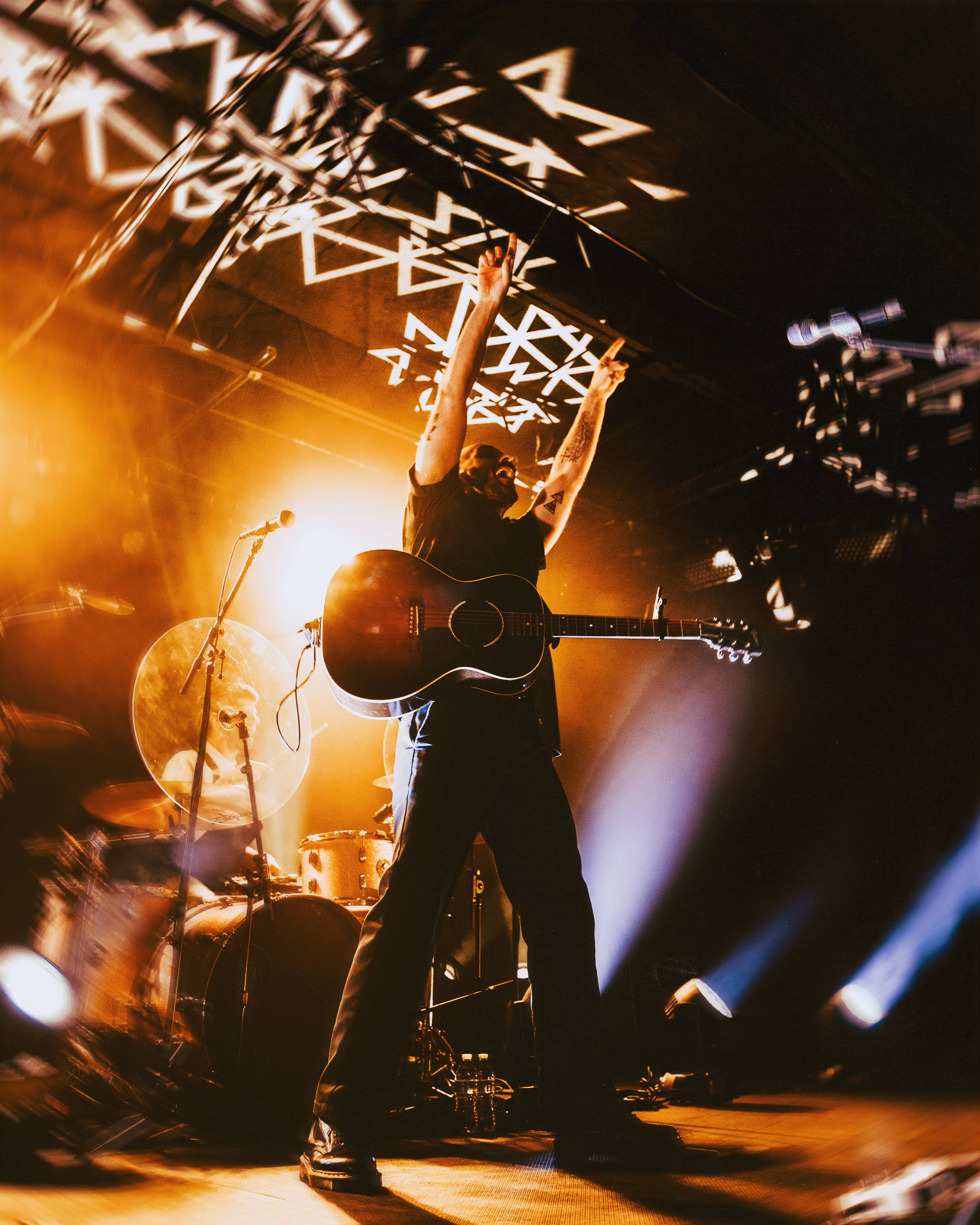 A photo of X Ambassadors performing at The Underground. 