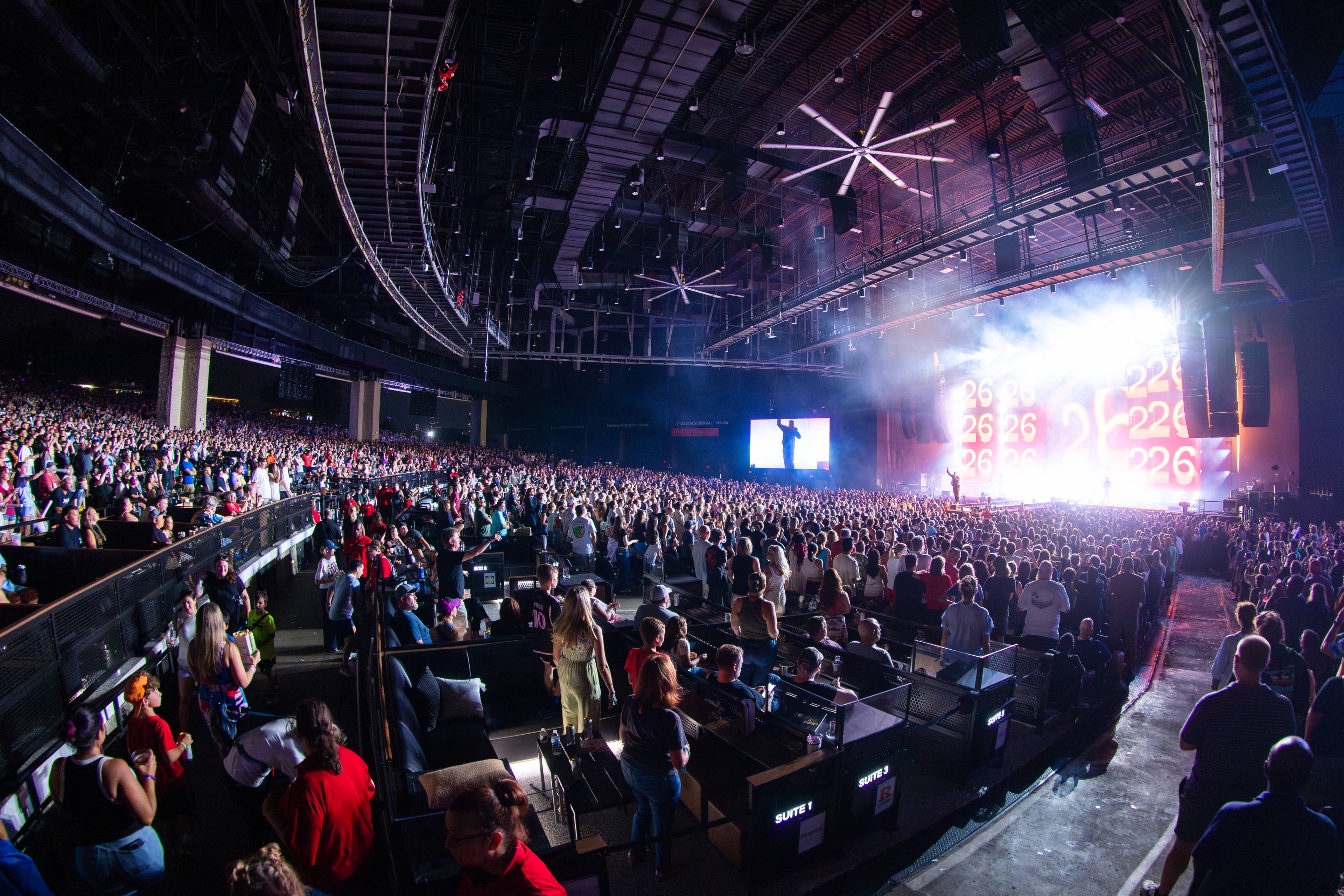 Crowd enjoying a concert.