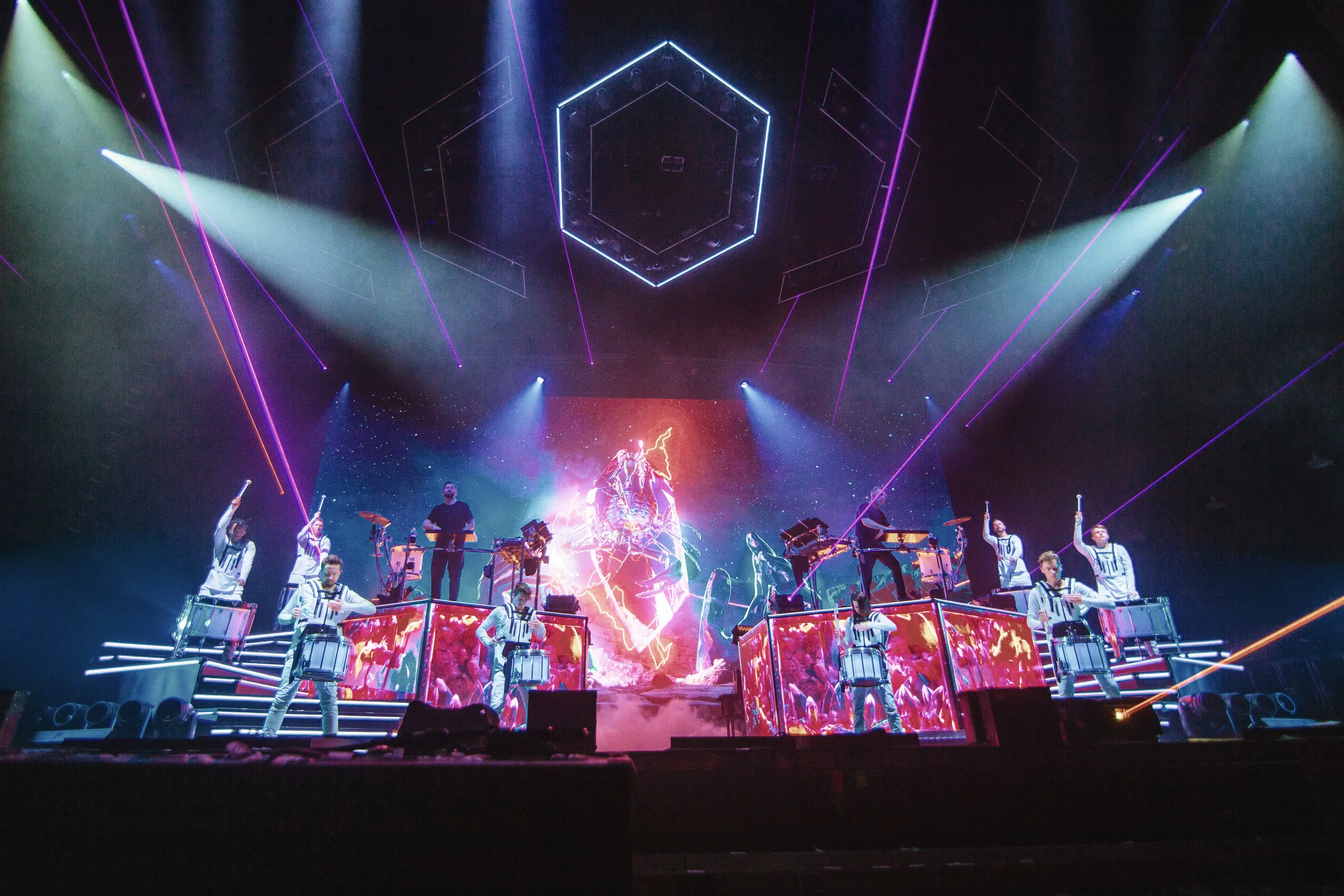 A picture of ODESZA performing at Truliant Amphitheater.
