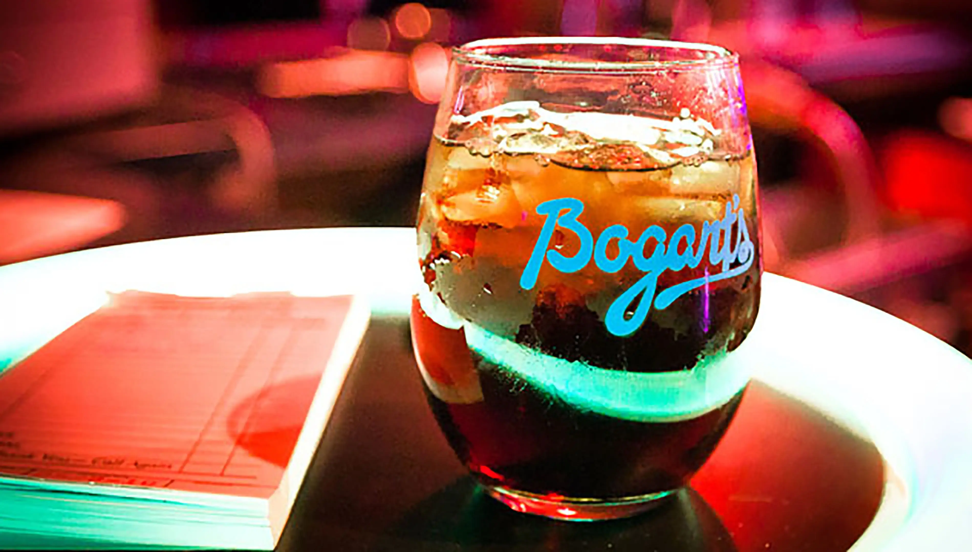 A drink with the Bogart's logo on it